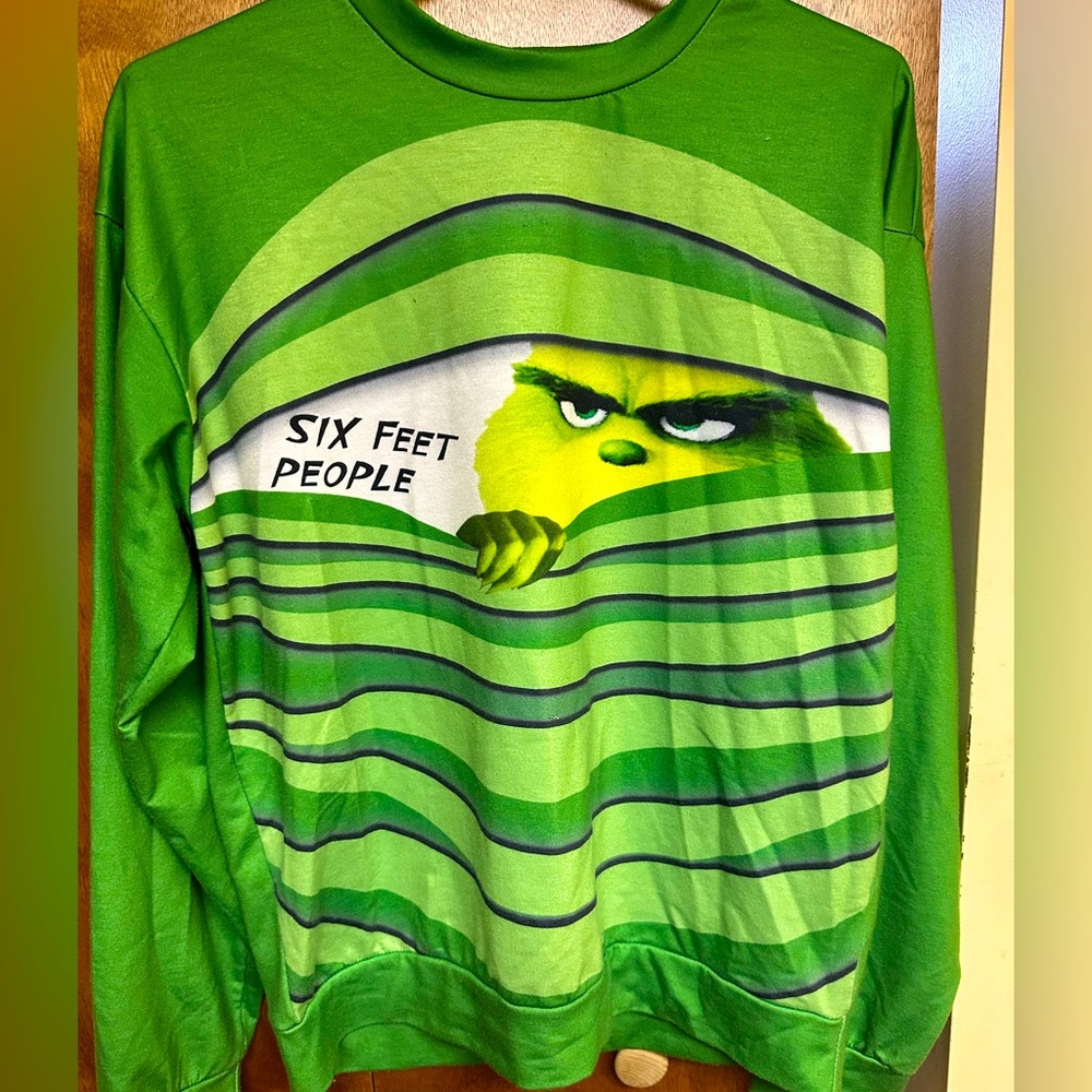 The Grinch “six feet people” sweatshirt